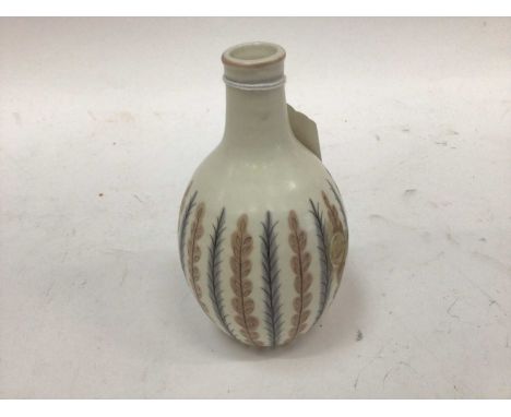 Poole pottery freeform vase decorated in the YCB pattern, 15cm highGood condition with no chips or cracks, although there is 