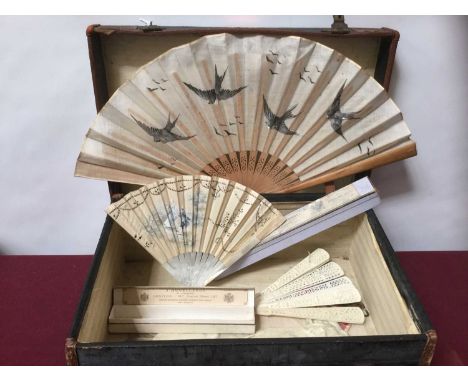 Group of fans by Duveleroy and others, also gloves, in vintage suitcase