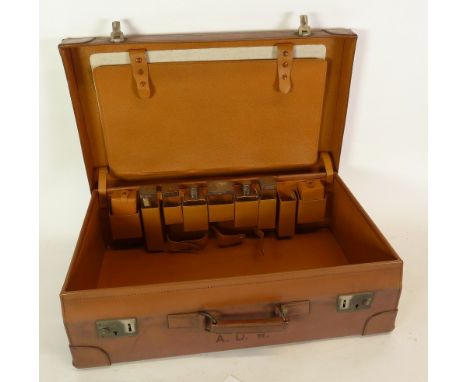 GOOD QUALITY 1940's GENTS LEATHER FITTED SUITCASE, containing six toilet jars and bottles with engine turned silver tops, Lon