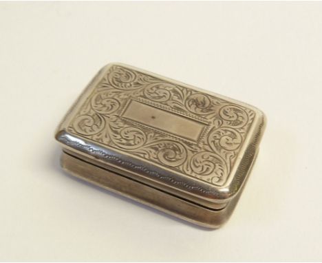 GEORGE VI SILVER OBLONG SNUFF BOX oblong with foliate scroll and foliate engraved decoration, plain concave sides, 1 3/8" (3.