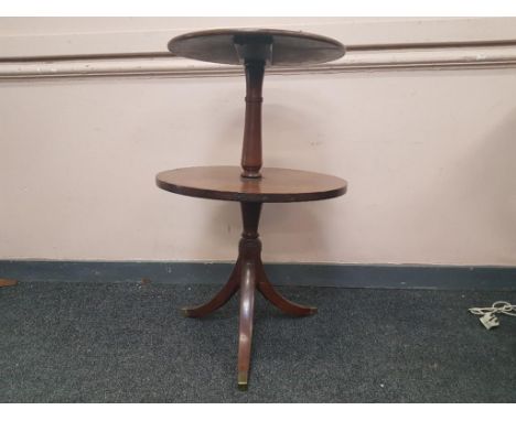 on a turned pillar support with tripod base leading to brass capped feet, 54cmï¿½wide 