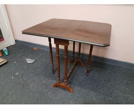 of rectangular form with moulded and chamfered top supported by turned double and gate legs, 75cm wide 