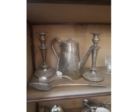 including 2 table candlesticks, a serving spoon, coffee pot and a ladle 