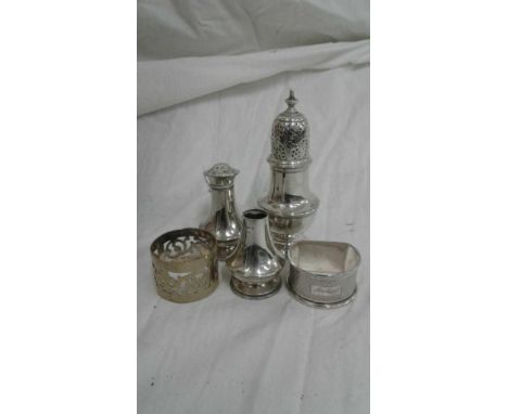 comprising of a muffineer, salt and pepper, pierced napkin ring and another engine turned example (5) 