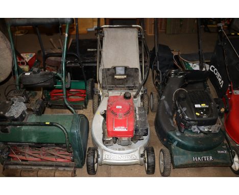 A Honda HR194 petrol rotary lawnmower