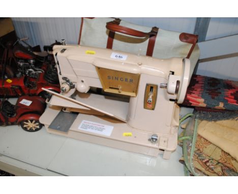A Singer sewing machine, sold as collectors item