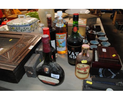 A Janneau bottle of Grand Armagnac and various other bottles of spirit etc.  