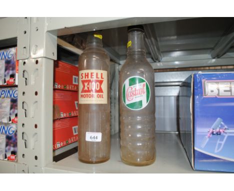 A shell advertising oil bottle and a Castrol advertising oil bottle 