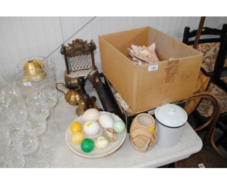 Two boxes containing seashells, collection of metal ware to include hand bells, ornamental eggs, a Cern fire - sold as collec