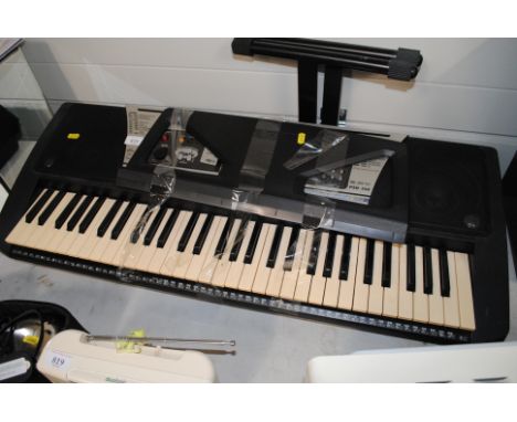 A Yamaha PSR-350 keyboard with stand