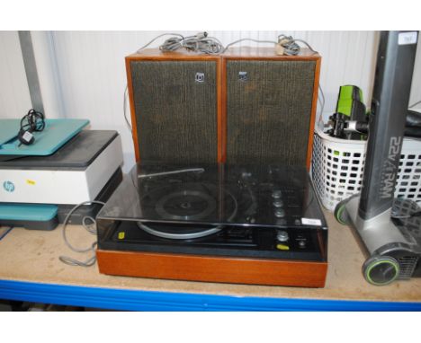 A Dynatron record player with Garrard Model SP25 deck and a pair of speakers