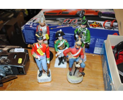Five porcelain figures depicting army officers, various regiments 