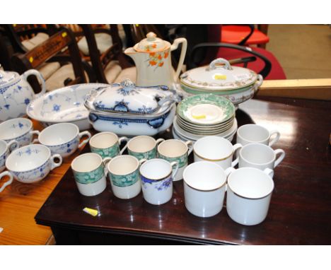 A collection of various coffee cans and saucers; a Victorian sauce tureen complete with ladle; another; and an Art Deco hot m