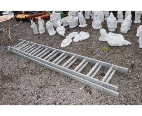 An aluminium extending ladder 