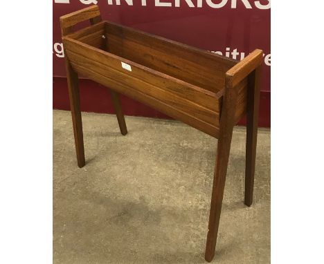 A teak planter 