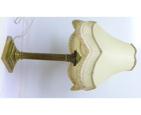 A brass Corinthian column table lamp