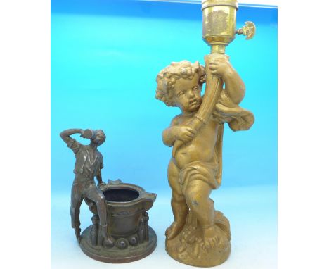 A spelter figure and a Putti table lamp base