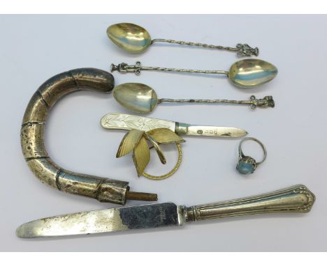 A silver and mother of pearl fruit knife, a silver parasol handle, white metal spoons, etc.