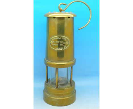 A miner's safety lamp marked Ferndale Coal & Mining Co.