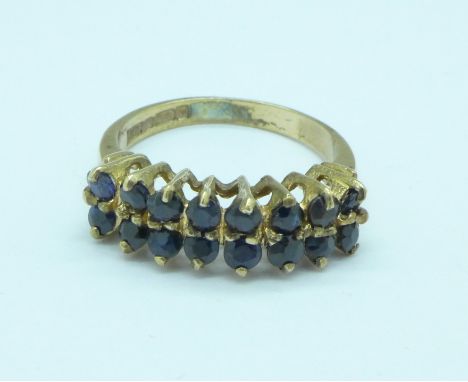 A 9ct gold, two row sapphire ring, 2.7g, K