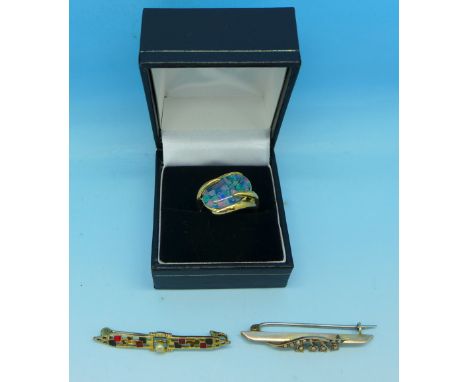 A 9ct gold and seed pearl brooch, a 9ct gold and opal set ring and a plated brooch, ring 3.7g, Q, 9ct brooch 1.8g