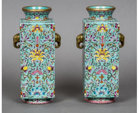 A pair of Chinese porcelain vasesEach of square form with twin elephant mask handles, decorated in the round with scrolling f