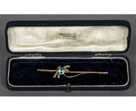 An Edwardian 9 ct gold, seed pearl and aquamarine bar broochSet with a dragonfly.  7.75 cm long.    CONDITION REPORTS:  Gener