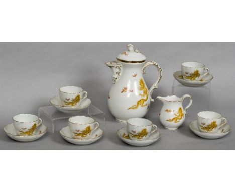 A Meissen porcelain coffee serviceComprising: coffee pot and cover, cream jug and six cups and saucers, decorated in the Yell