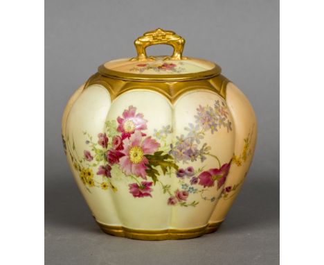 A Royal Worcester blush ivory lidded vaseOf lobed form with floral decoration.  17 cm high.   CONDITION REPORTS:  Some decora