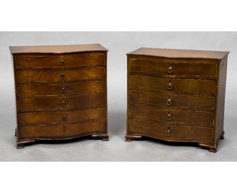 A near pair of Edwardian mahogany miniature serpentine chests of drawersEach shaped top above herringbone inlaid serpentine d