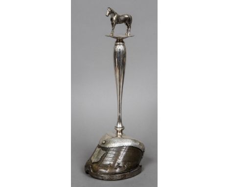 An early 20th century silver plate mounted horses hoof door stopThe handle formed as a horse above a tapering baluster column