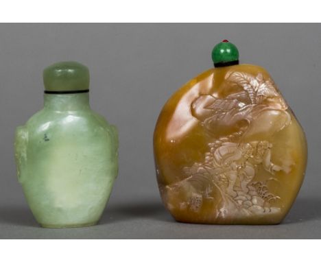 A Chinese carved jade snuff bottle and stopperTogether with another, hardstone, the former worked with twin handles, the latt