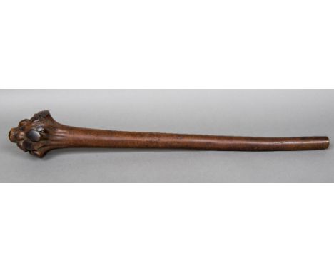 A large Fijian dromudromu war clubFormed from the root ball and trunk of a young ironwood sapling.  97 cm long.    CONDITION 