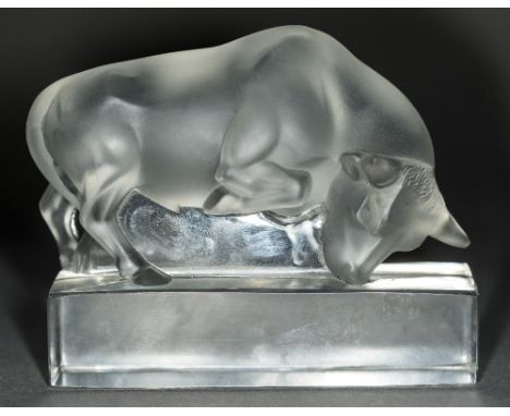 A Lalique frosted glass model of a bullStanding on a plinth base, signed.  8.5 cm high.    CONDITION REPORTS:  Generally in g