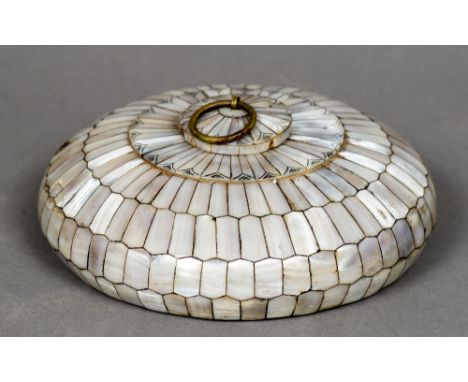 A mother-of-pearl mounted Gujarat box and coverOf stepped domed form with removable lid.  17 cm diameter.    CONDITION REPORT
