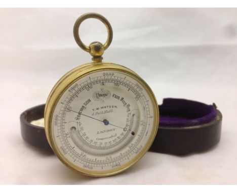 A 19th century gilt metal cased pocket barometer and thermometer by T W Watson, Pall Mall, LondonThe silvered dial signed, ho