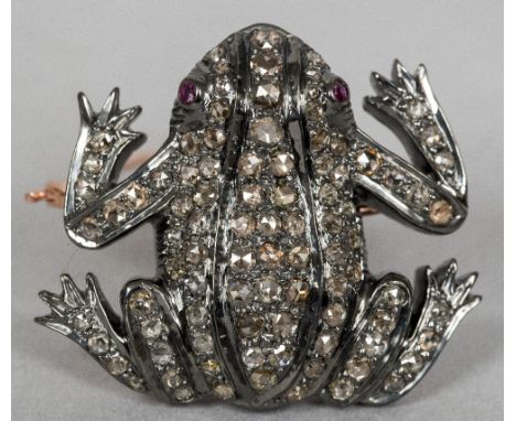 An unmarked white and yellow metal diamond and ruby set broochModelled as a frog.  3.5 cm wide.    CONDITION REPORTS:  Genera