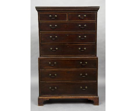 A George III mahogany chest on chestThe cornice with Greek key mouldings above an arrangement of two short and three long dra