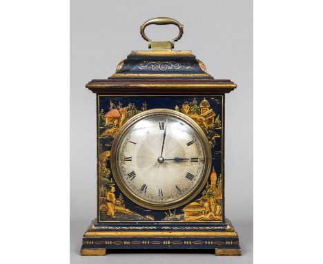 An early 20th century chinoiserie lacquered mantel clockThe stepped domed top with brass loop handle above the silvered dial 