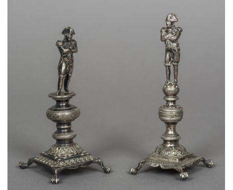 A silver model of Napoleon, indistinctly marked, probably French, maker's mark of JEModelled standing atop a pierced column, 