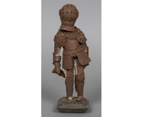 A small articulated model of a suit of armour, possibly a Victorian child's modelMounted on a wooden plinth base.  26 cm high