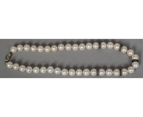 An 18 ct white gold diamond set pearl necklace45 cm long overall.   CONDITION REPORTS:  Generally in good condition, expected
