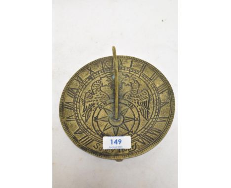 A 20th century sundial with a foliate styled Gnomon with chase style decoration of two phoenix.
15,5cm across.