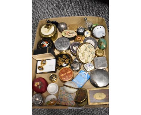 A collection of modern and vintage pill boxes, snuff style cases and trinket boxes.
