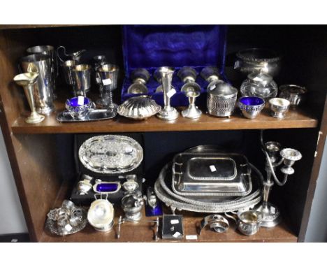 A selection of silver plated wares including a cased set of goblets, trinket dishes, table salt and tankards.