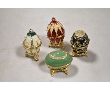 Four modern Atlas Edition collectors eggs having original boxes.