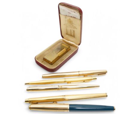 Dunhill Rollagas gold plated lighter, boxed and with instructions, Parker fountain pen with 14ct gold nib and four other pens