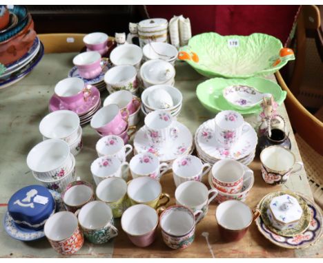 Six Spode china “Dorothy Perkins” coffee cups; eleven ditto saucers; a Carlton ware moulded green-leaf dish; a Beswick ware d