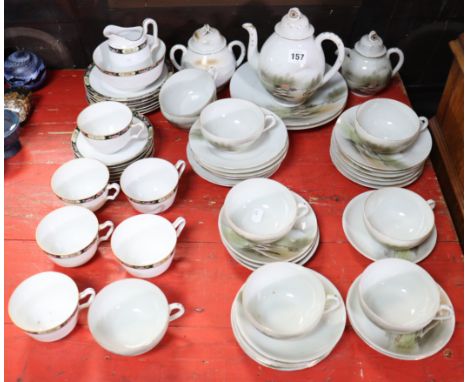 A Japanese egg-shell thirty-six piece part tea service of white ground &amp; with mountain landscape decoration; &amp; a Nori