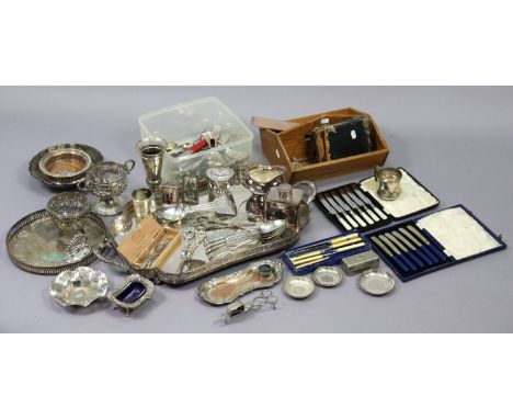 An engraved silver-plated rectangular two-handled tea tray with a pierced gallery, 26” wide; together with a plated tea caddy